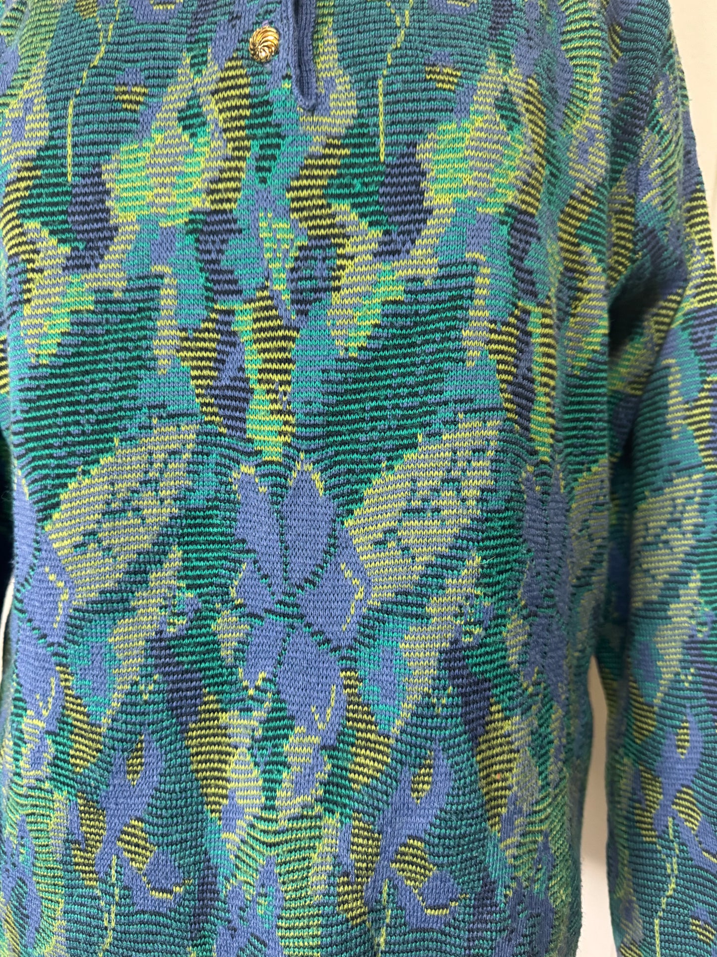 Pull à motifs vert