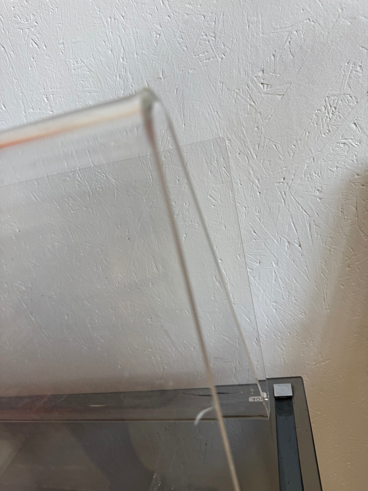 Porte revue en plexiglas