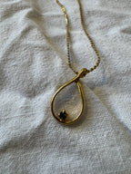 Collier en métal doré