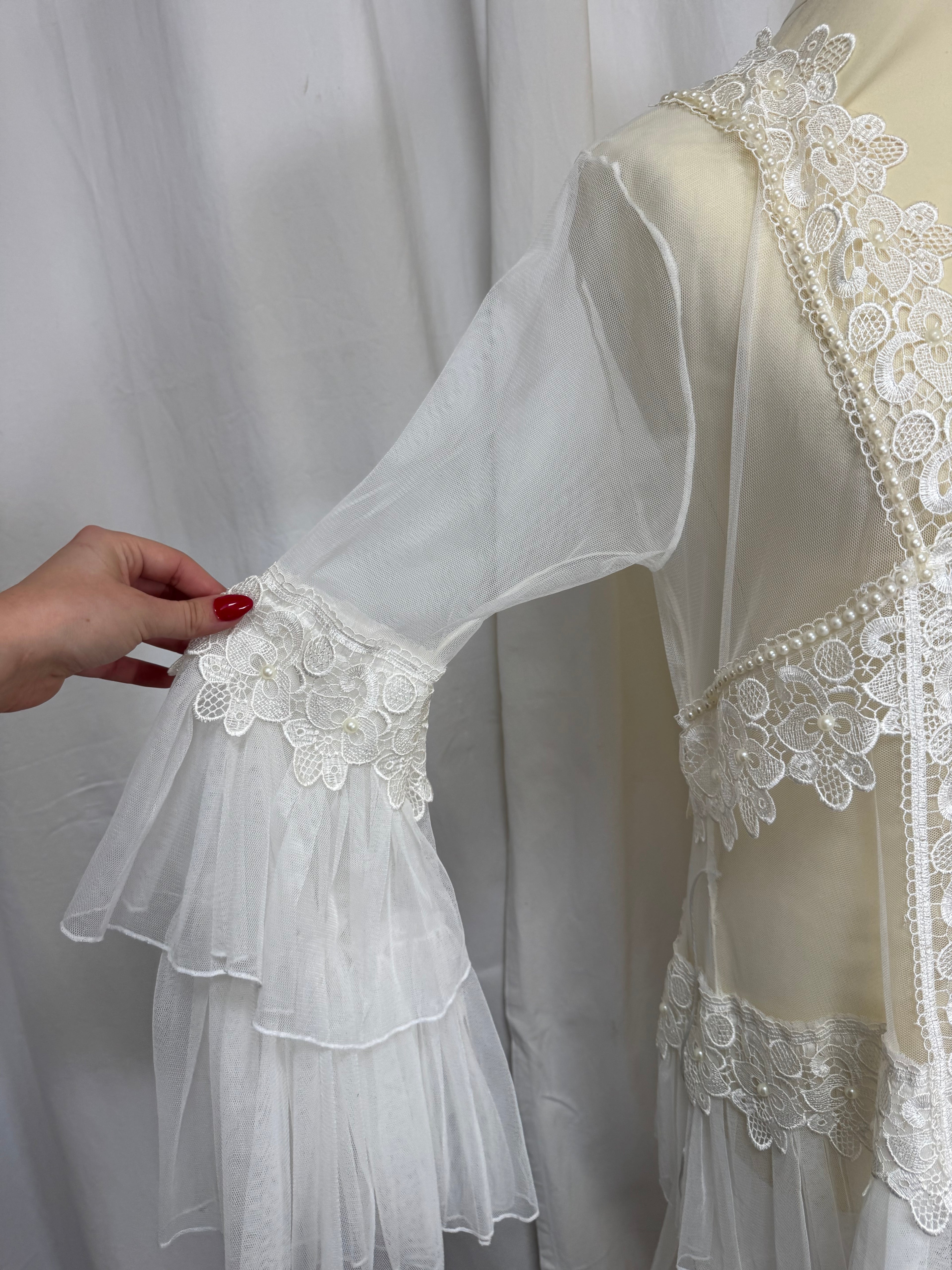 Veste longue en dentelle