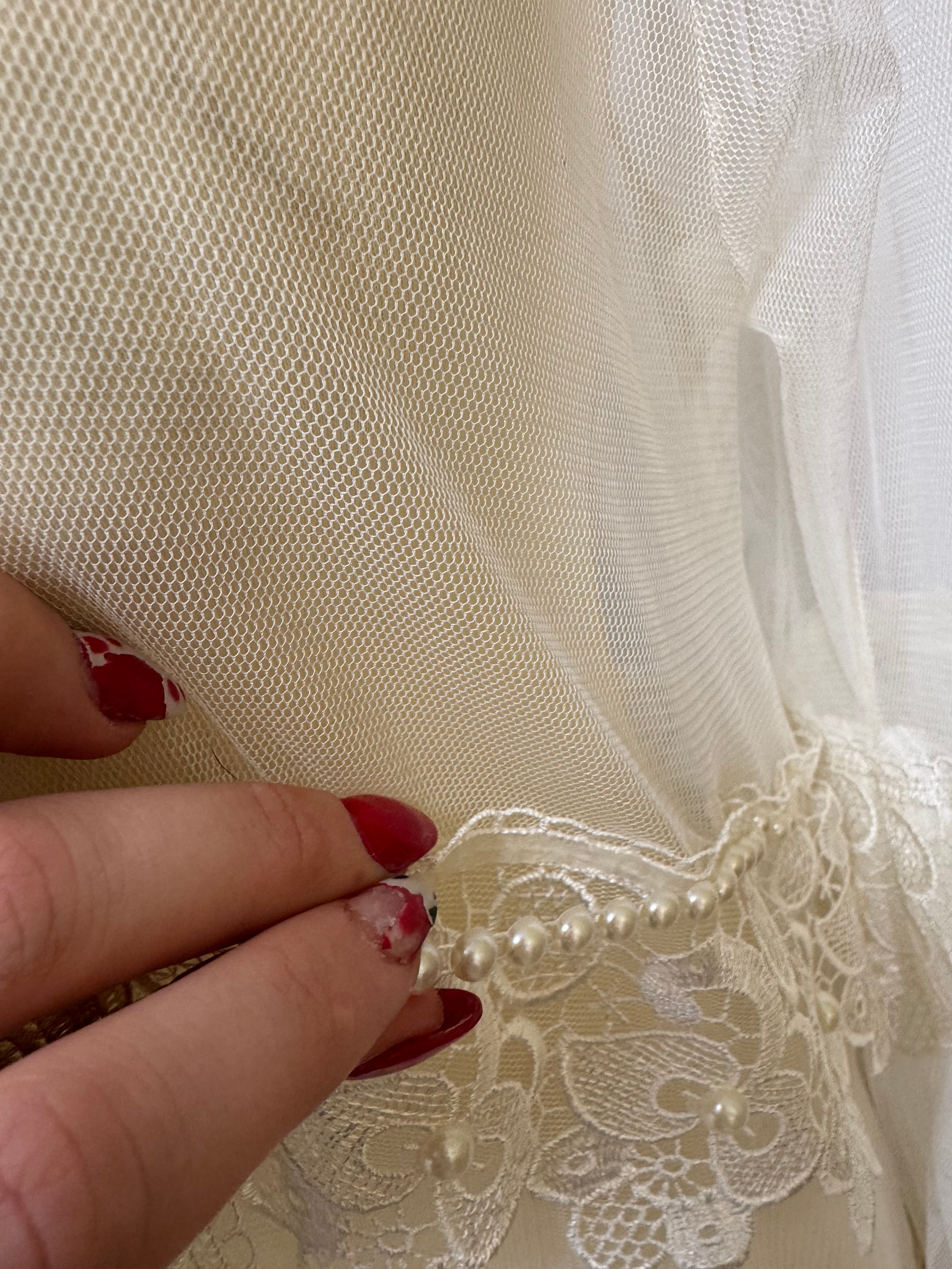 Veste longue en dentelle