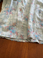 Blouse courte à fleurs