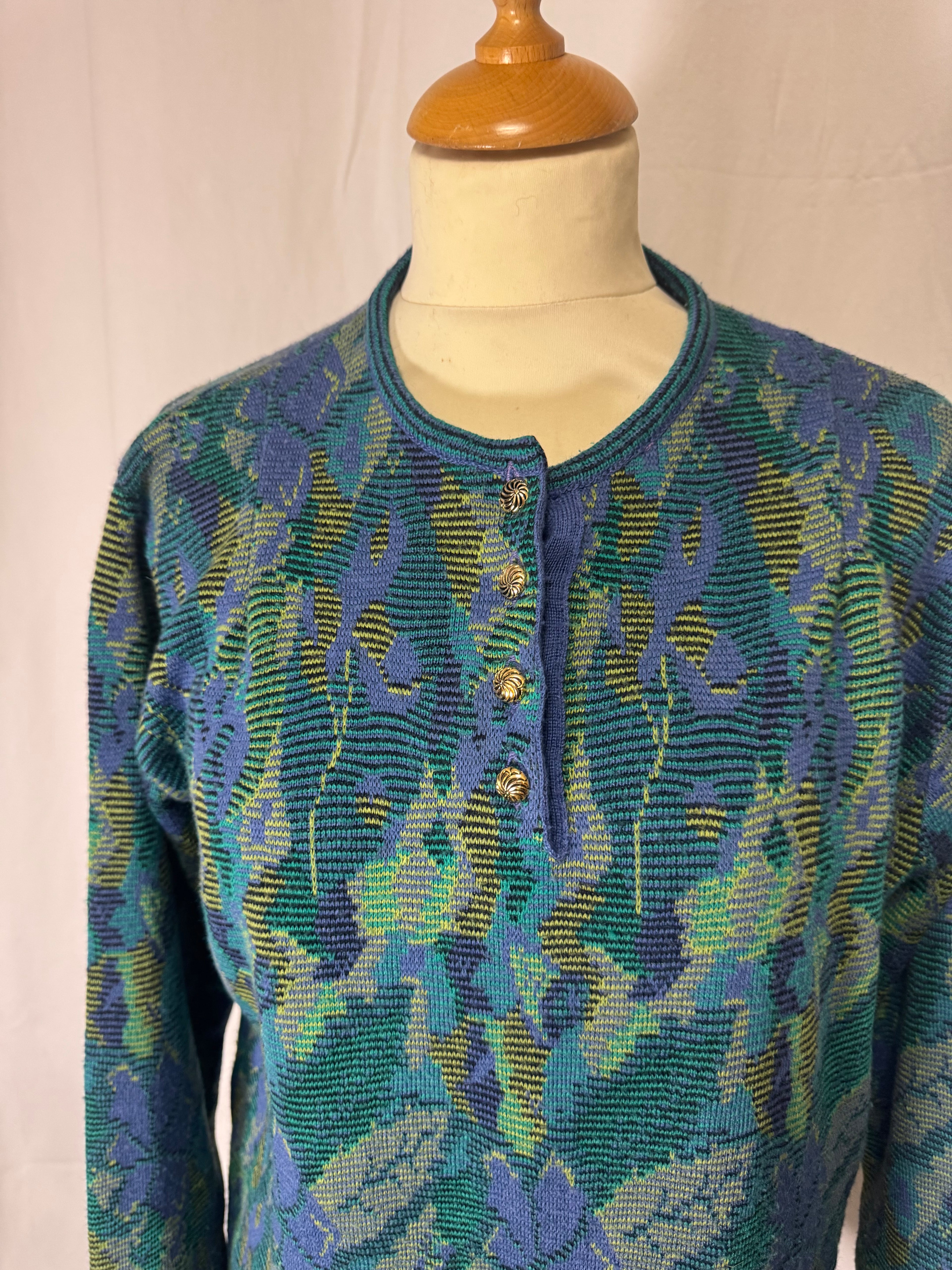 Pull à motifs vert