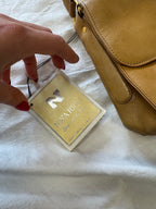 Sac baguette en cuir beige Nina Ricci