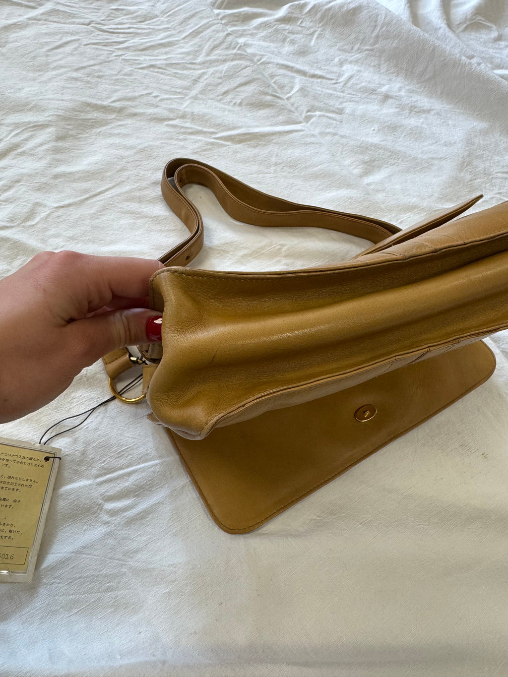 Sac baguette en cuir beige Nina Ricci