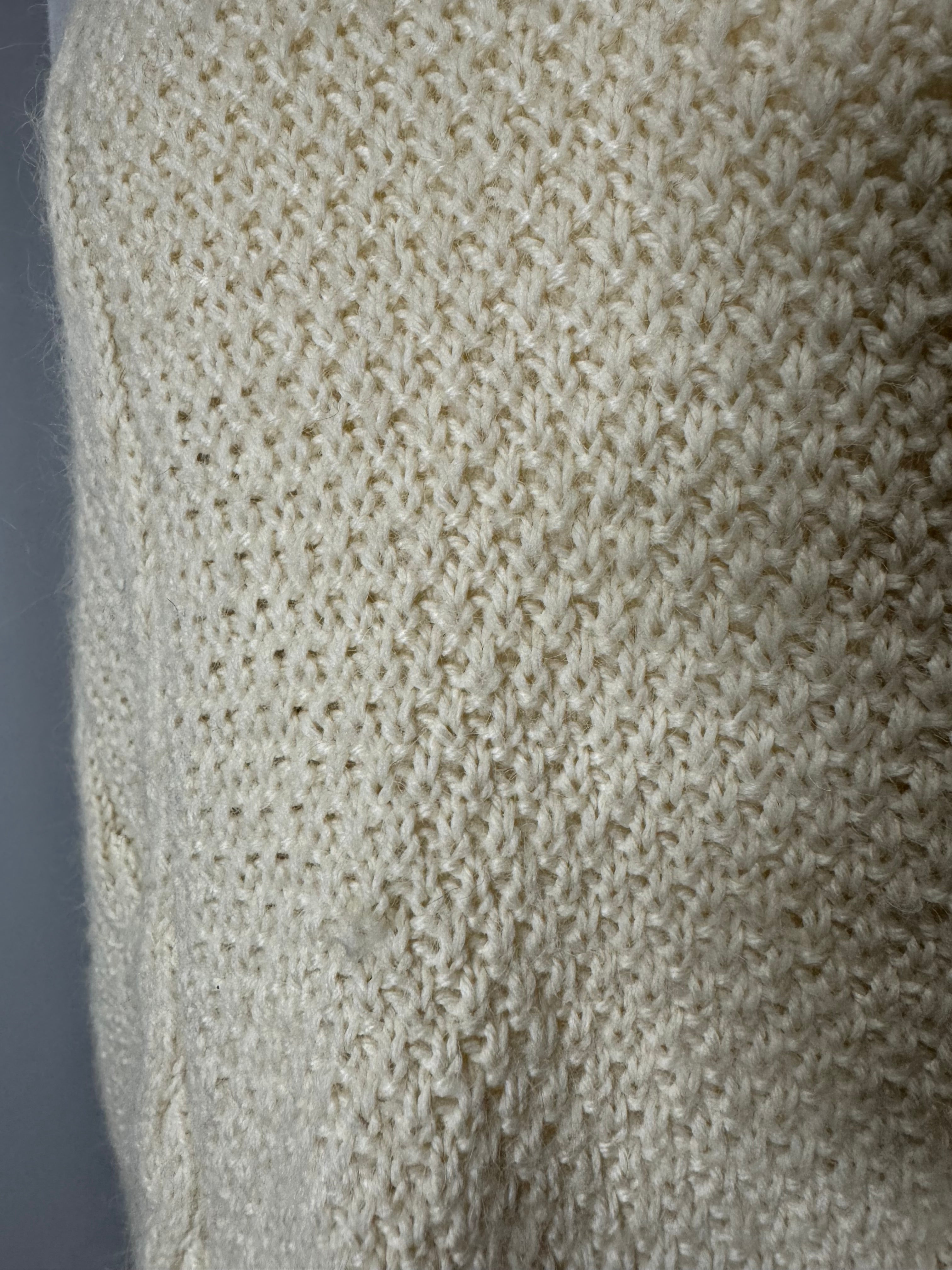 Pull écrue torsade