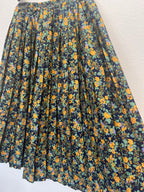 Jupe plissée à fleurs