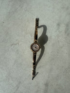 Montres en métal doré