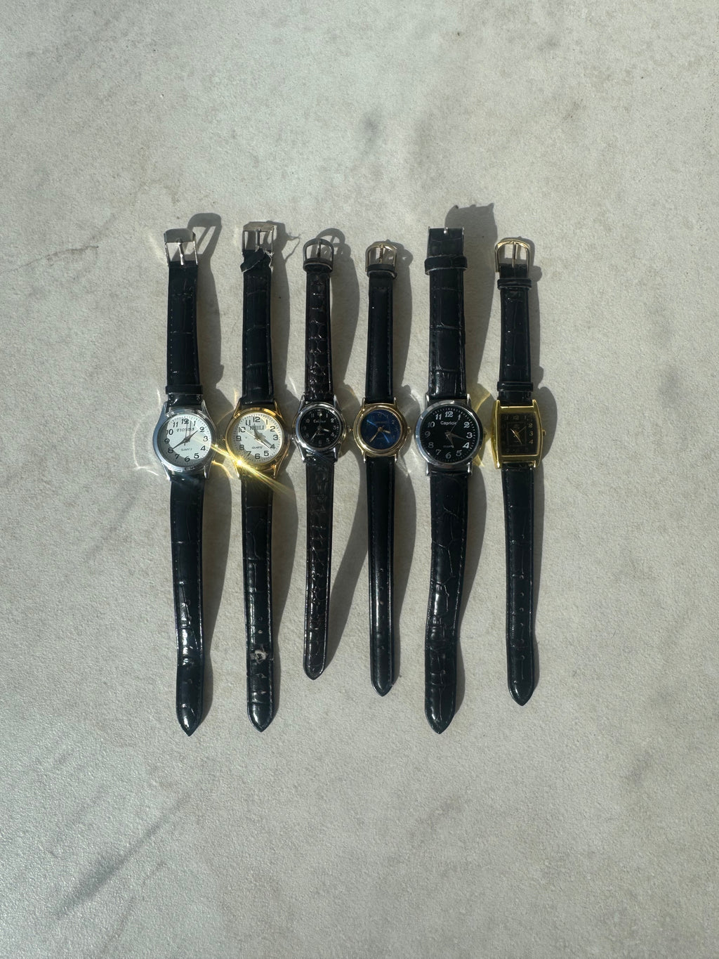 Montres en cuir noires
