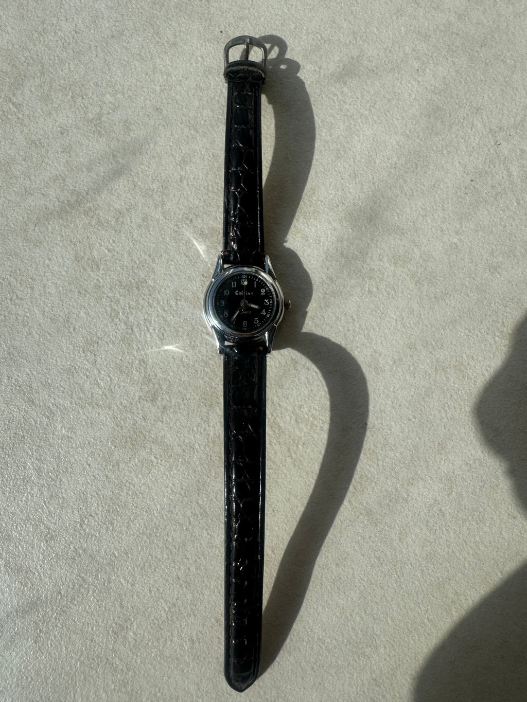 Montres en cuir noires