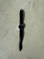 Montres en cuir noires