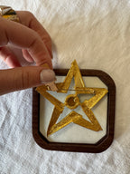 Broche en métal étoile 80s