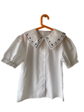 Chemise à grand col